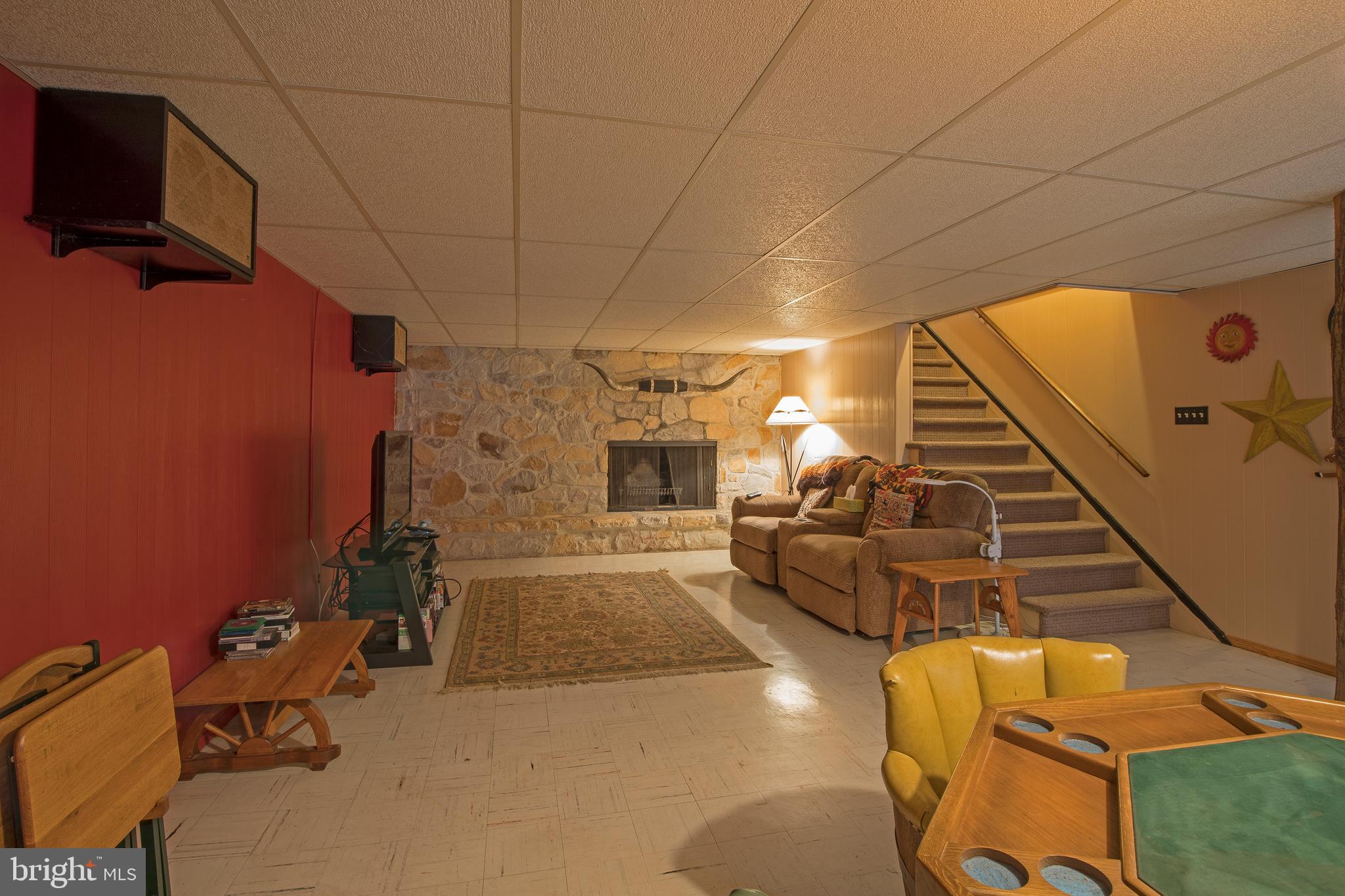 975 Limekiln Road Doylestown, PA 18901 - Photo 43 of 47 Finished Basement with wood burning Fireplace