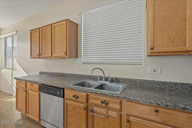 a kitchen with a stove microwave and refrigerator
