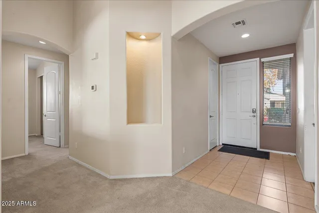 a view of a kitchen with a sink and a cabinet