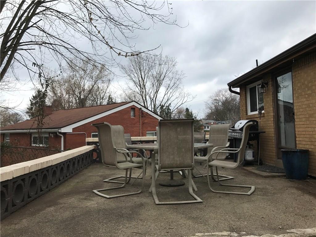 613 Winterberry Road Monroeville, PA 15146 - Photo 18 of 25 Back patio space off the kitchen - grill ready!