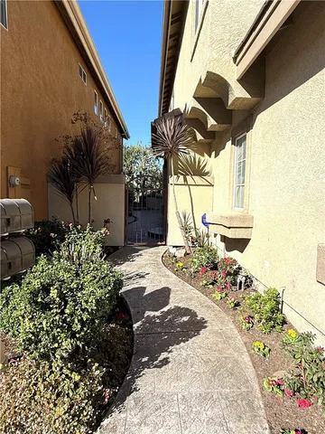 a view of a backyard of the house