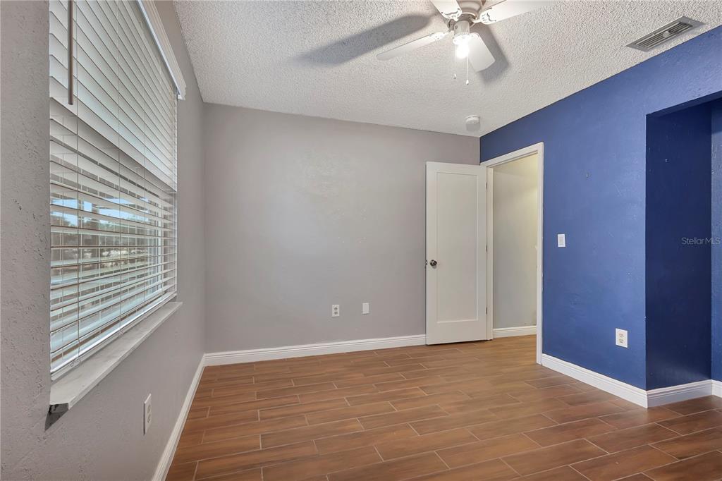 7737 Mitchell Ranch Road New Port Richey, FL 34655 - Photo 22 of 27 a view of an empty room with a window