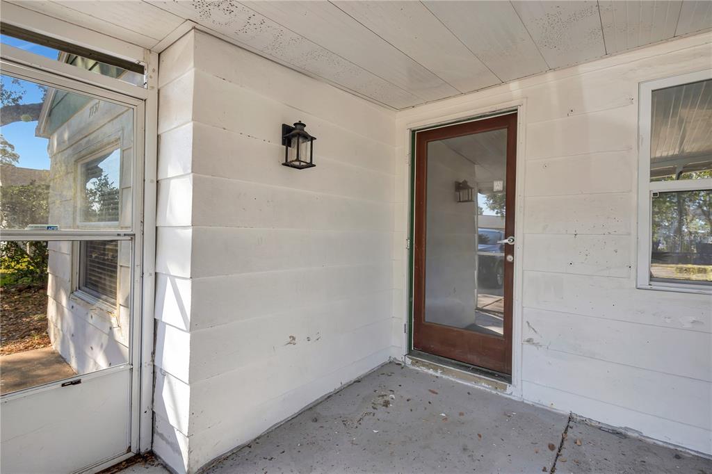 7737 Mitchell Ranch Road New Port Richey, FL 34655 - Photo 3 of 27 an empty room with windows
