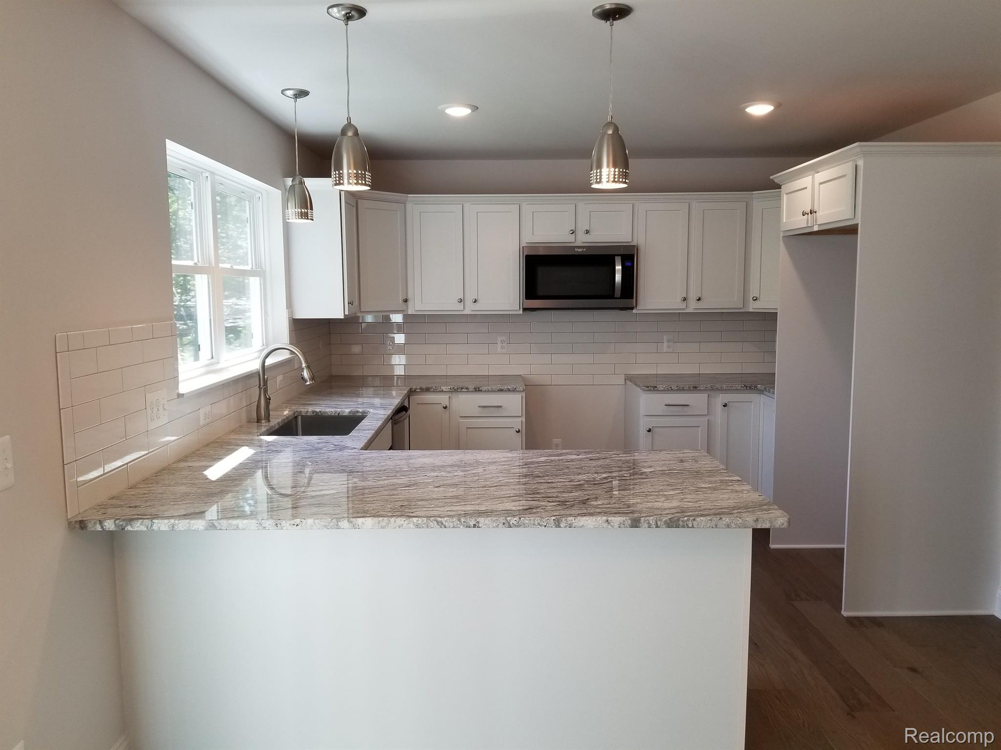 2195 Sundance Ridge Howell, MI 48843 - Photo 4 of 24 KITCHEN