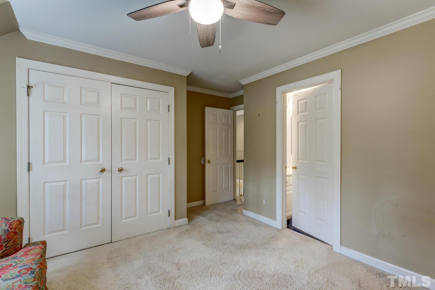 2021 Rolling Rock Road Wake Forest, NC 27587 - Photo 24 of 27 a view of a room with a ceiling fan