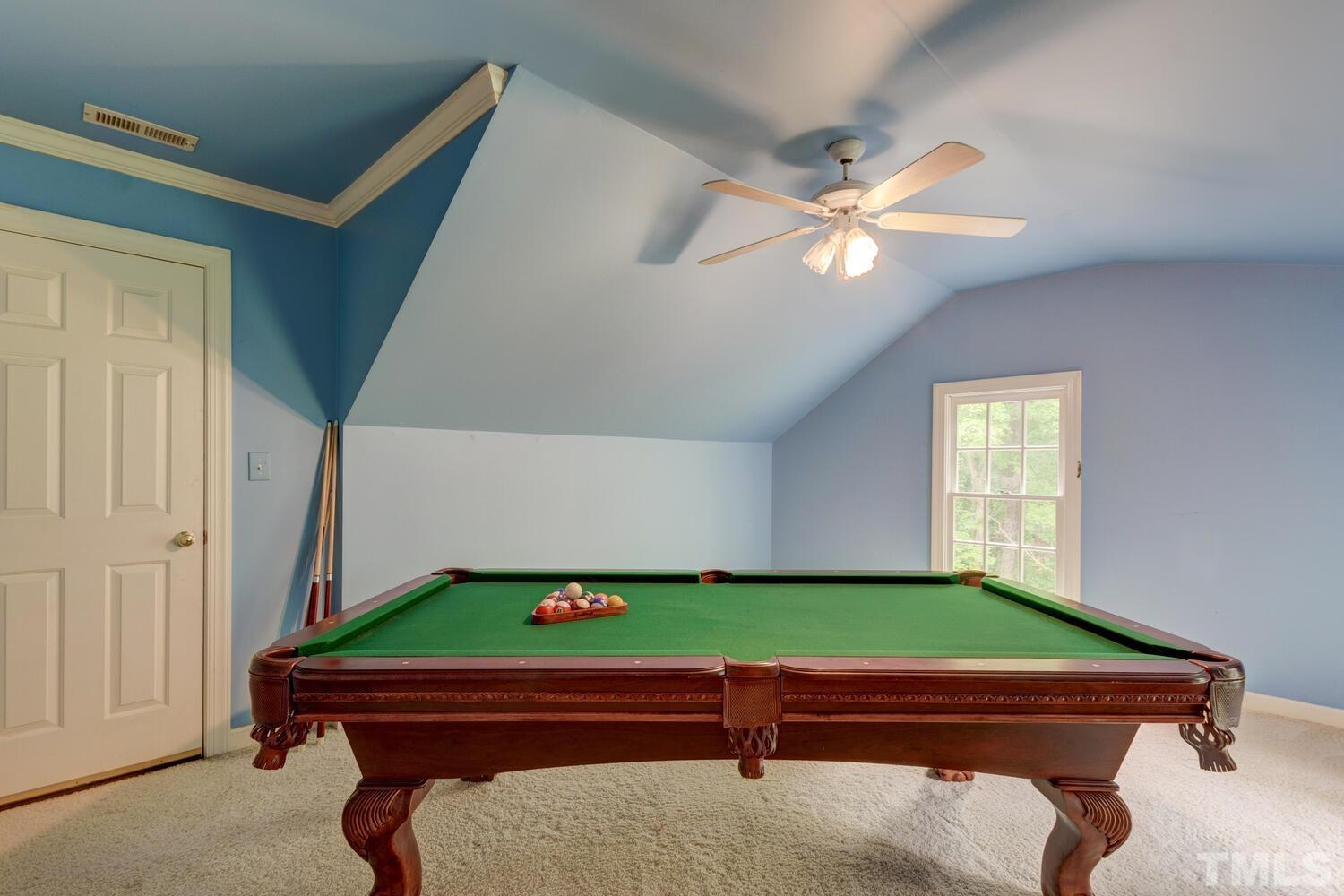 2021 Rolling Rock Road Wake Forest, NC 27587 - Photo 26 of 27 a room with pool table and fan
