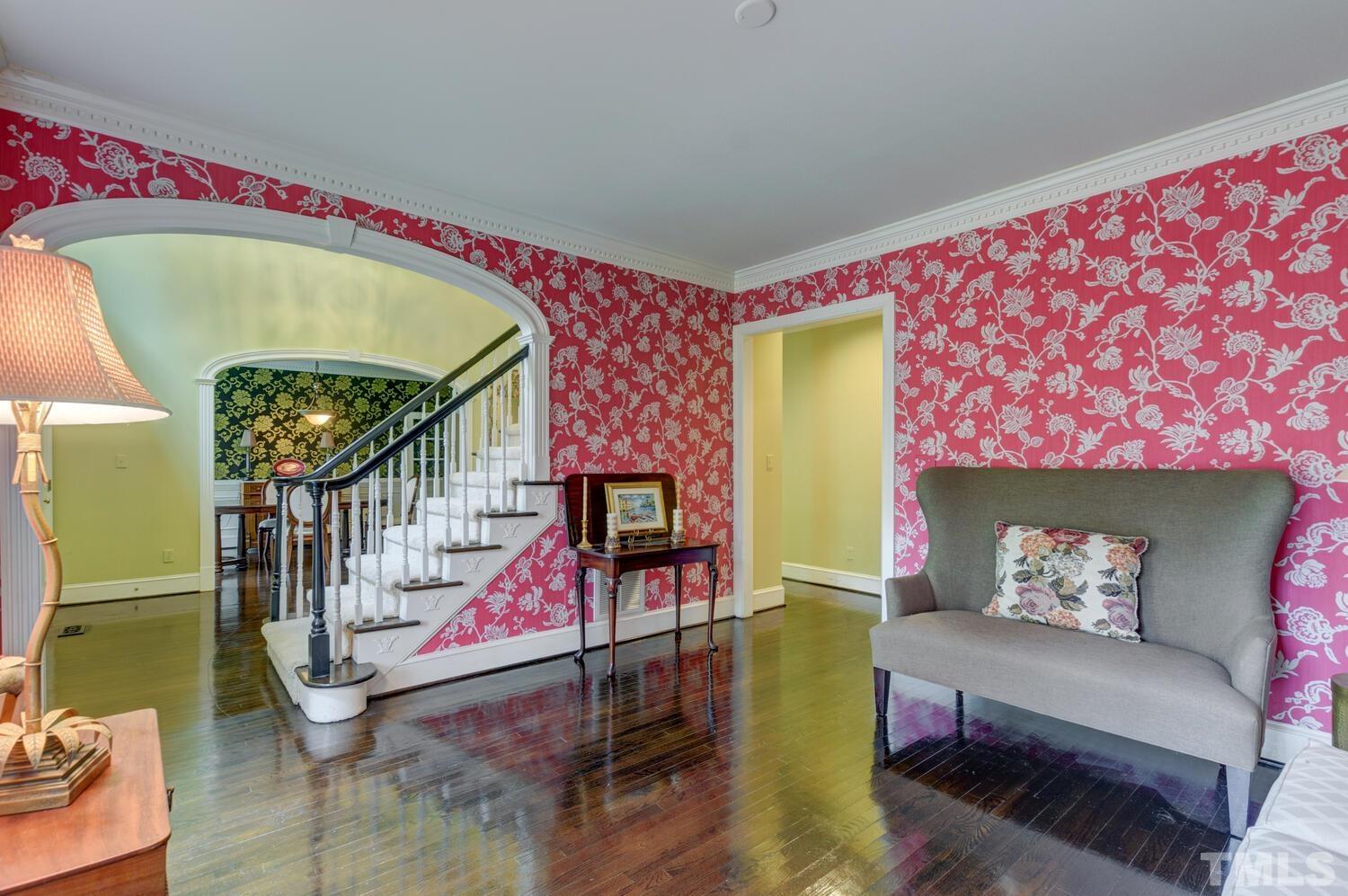 2021 Rolling Rock Road Wake Forest, NC 27587 - Photo 5 of 27 a bedroom with furniture and a wooden floor