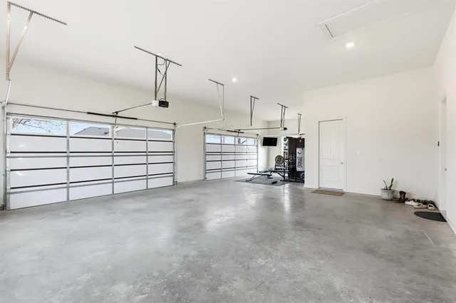 a view of empty room with a fireplace