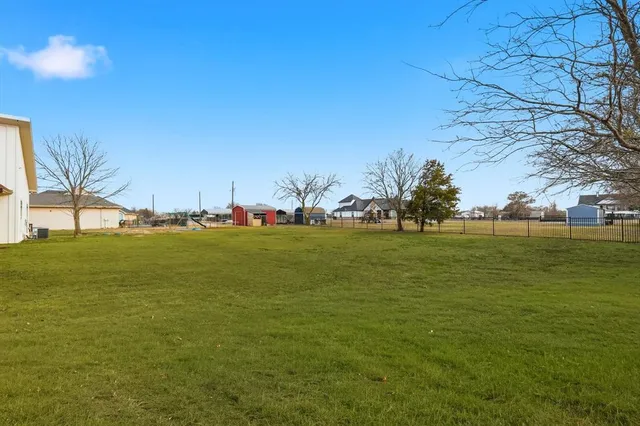 an aerial view of a swimming pool and mountain view