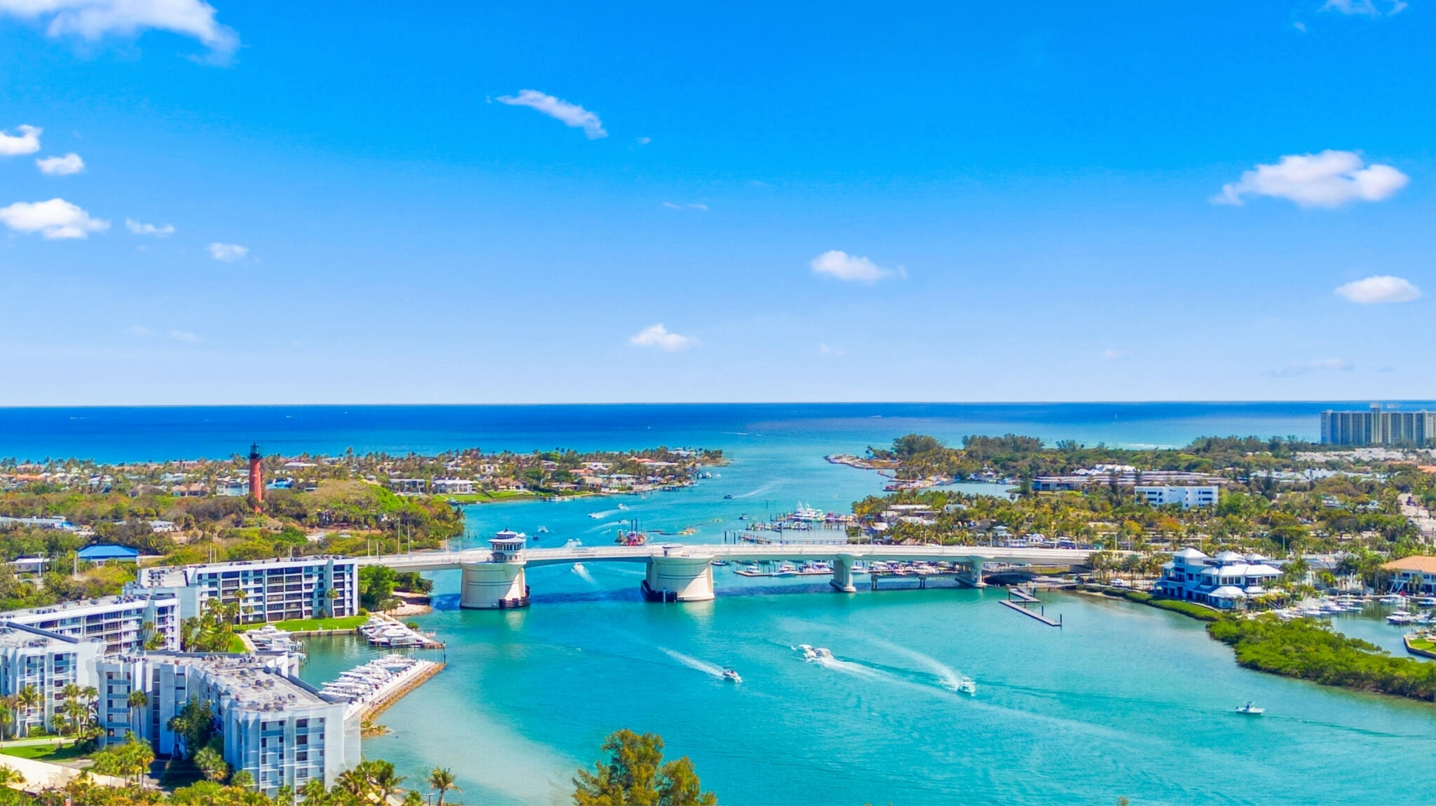 1305 Peninsular Road Jupiter, FL 33469 - Photo 13 of 23 a view of a city with lawn chairs