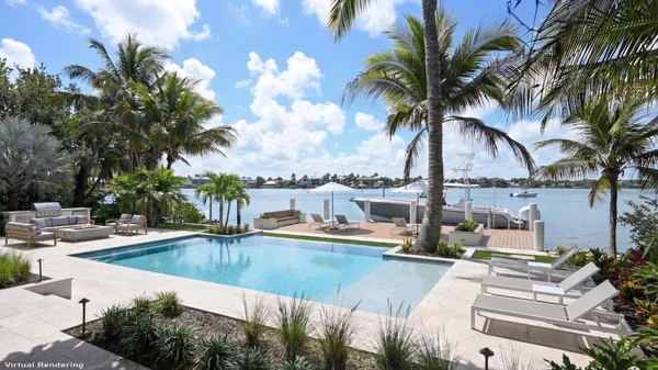 a view of a swimming pool with a patio