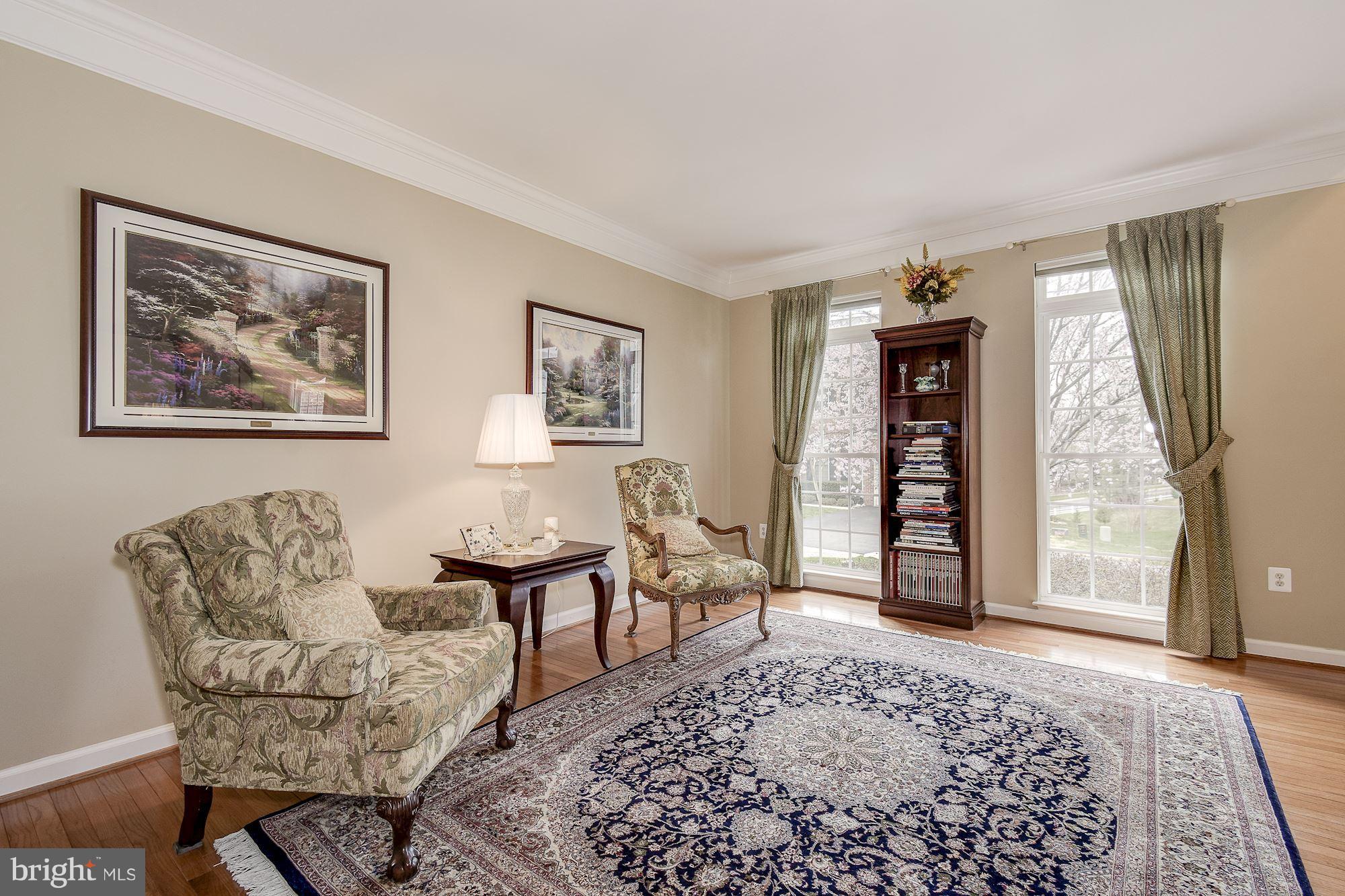 8639 Hillside Manor Drive Springfield, VA 22152 - Photo 11 of 30 a living room with furniture and a window