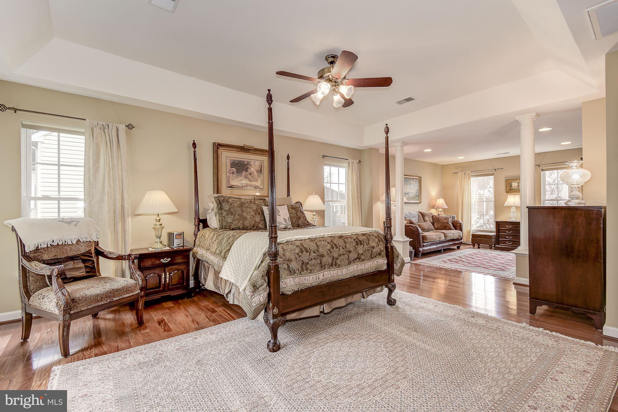 8639 Hillside Manor Drive Springfield, VA 22152 - Photo 5 of 30 a bedroom with bed and window