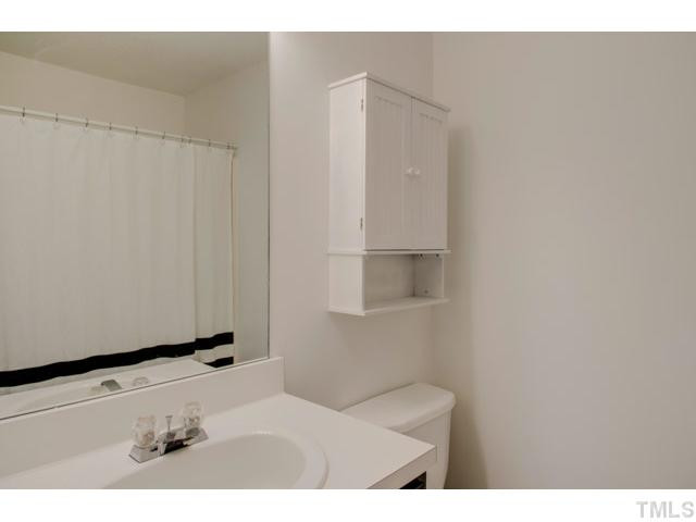 4512 Nightfall Court Durham, NC 27713 - Photo 16 of 24 a bathroom with a window