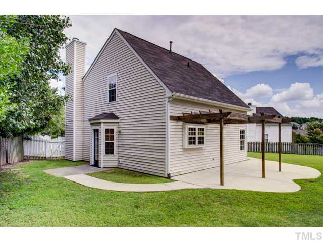 4512 Nightfall Court Durham, NC 27713 - Photo 22 of 24 a view of a house with a backyard