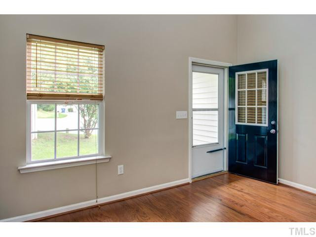 4512 Nightfall Court Durham, NC 27713 - Photo 3 of 24 a view of an empty room with a window