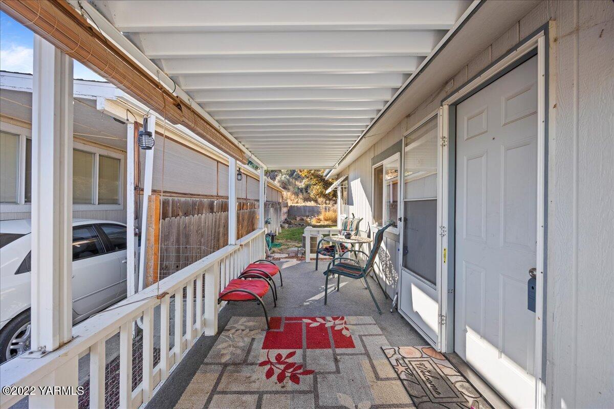 300 Alps Road, Unit 1008 Moxee, WA 98936 - Photo 5 of 22 a view of a balcony with furniture