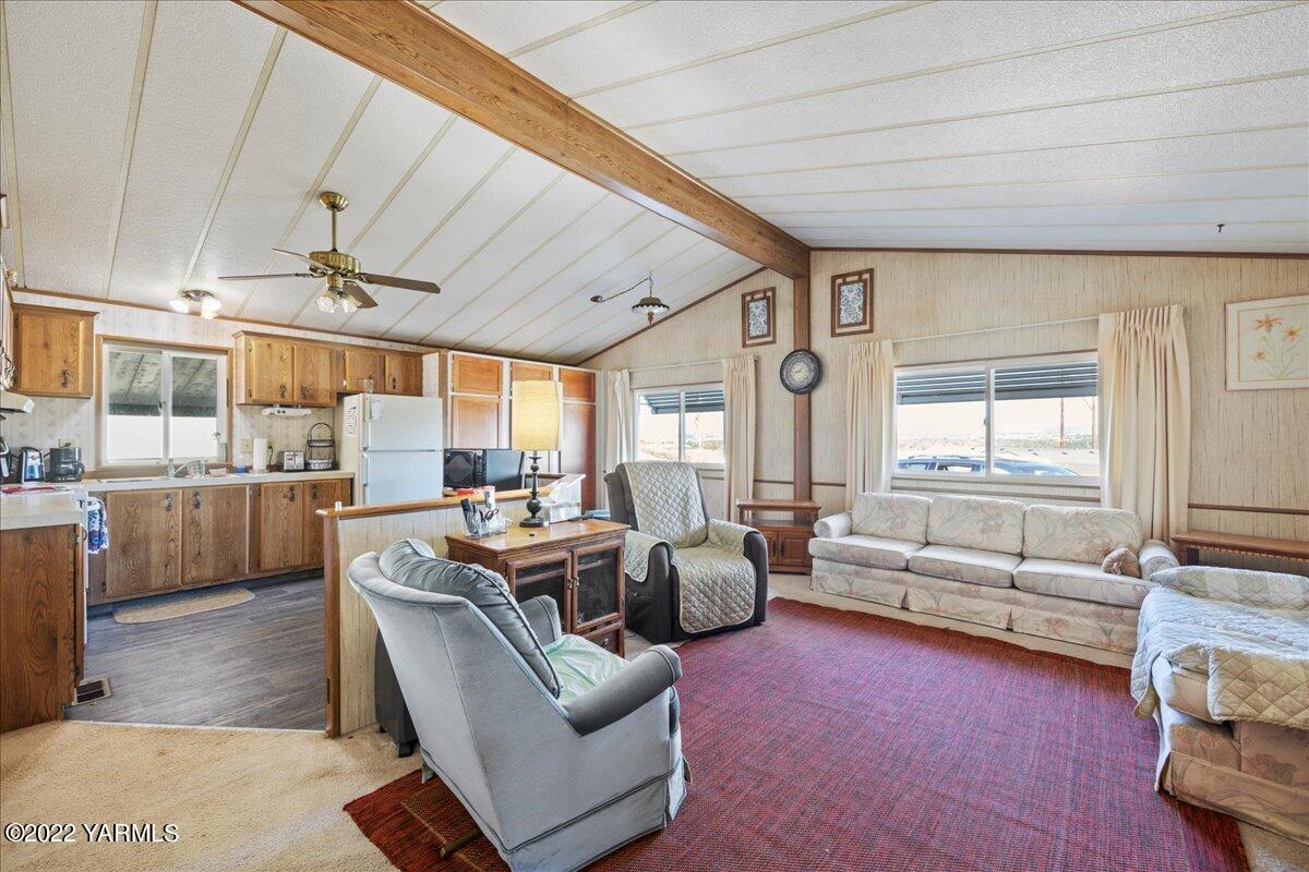 300 Alps Road, Unit 1008 Moxee, WA 98936 - Photo 6 of 22 a living room with furniture and a large window