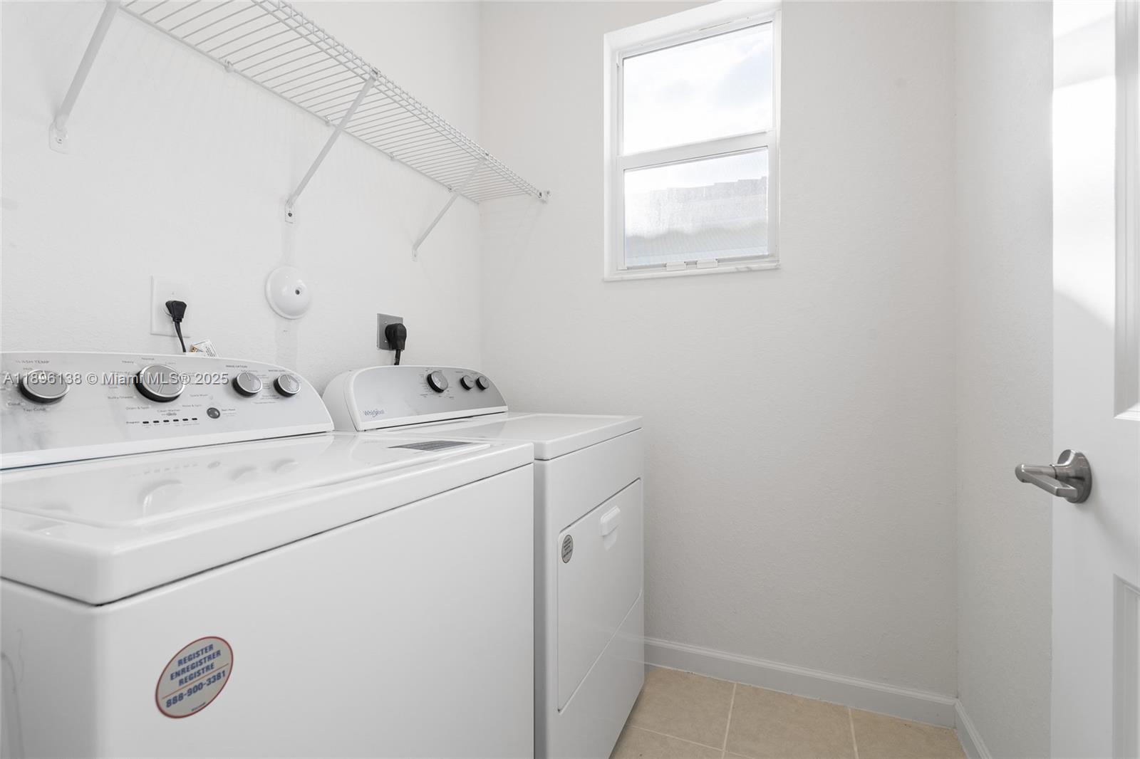 2405 Northwest 131st Street Miami, FL 33167 - Photo 25 of 38 a utility room with dryer and washer