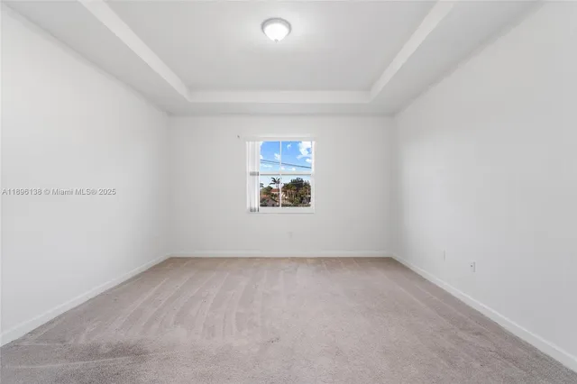 a view of a backyard with a garden