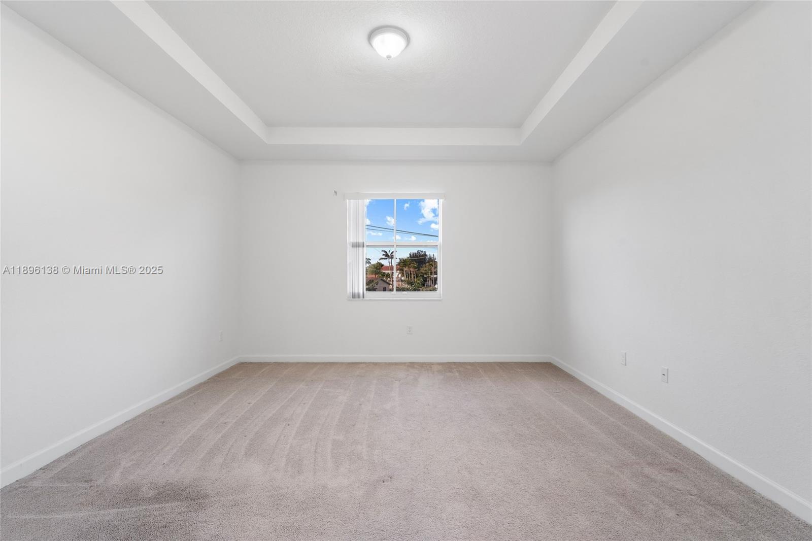 2405 Northwest 131st Street Miami, FL 33167 - Photo 30 of 38 an empty room with a window