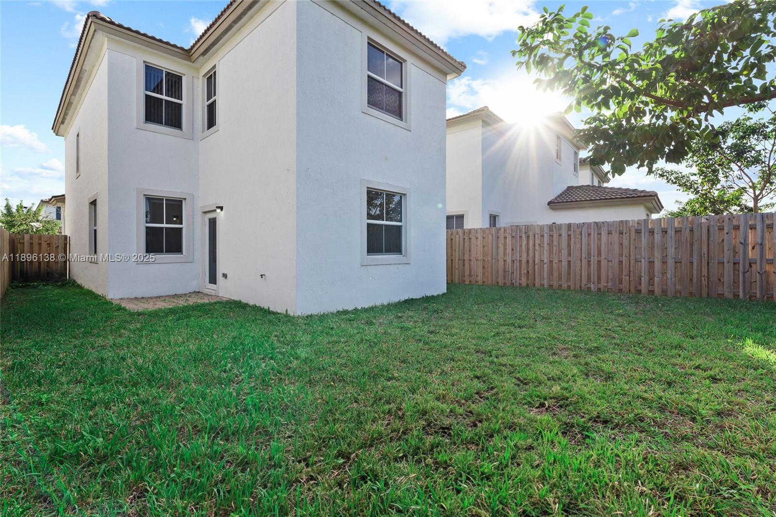 2405 Northwest 131st Street Miami, FL 33167 - Photo 33 of 38 a view of a house with backyard and garden