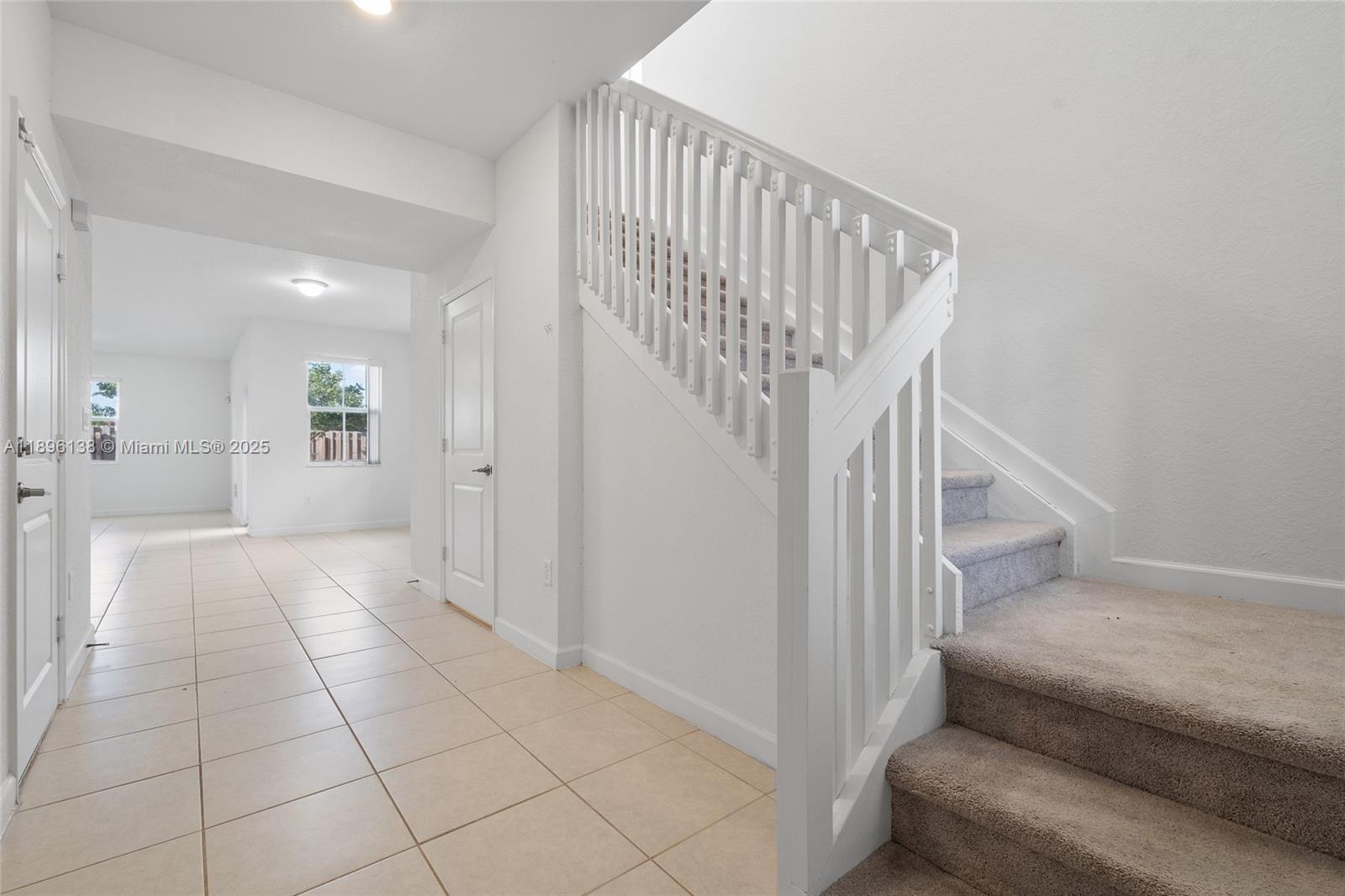 2405 Northwest 131st Street Miami, FL 33167 - Photo 8 of 38 a view of entryway and hall with a couch