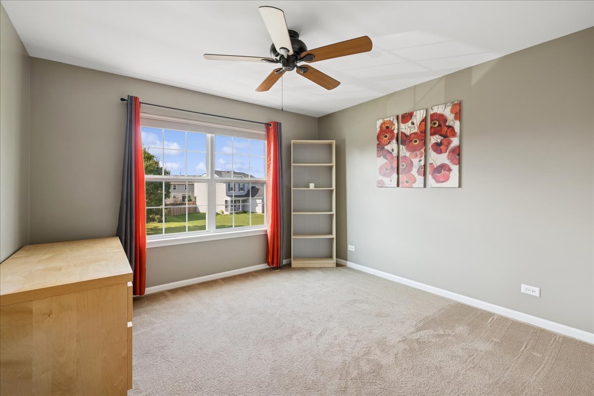 2681 Braeburn Way Woodstock, IL 60098 - Photo 18 of 41 a furnished livingroom with a window