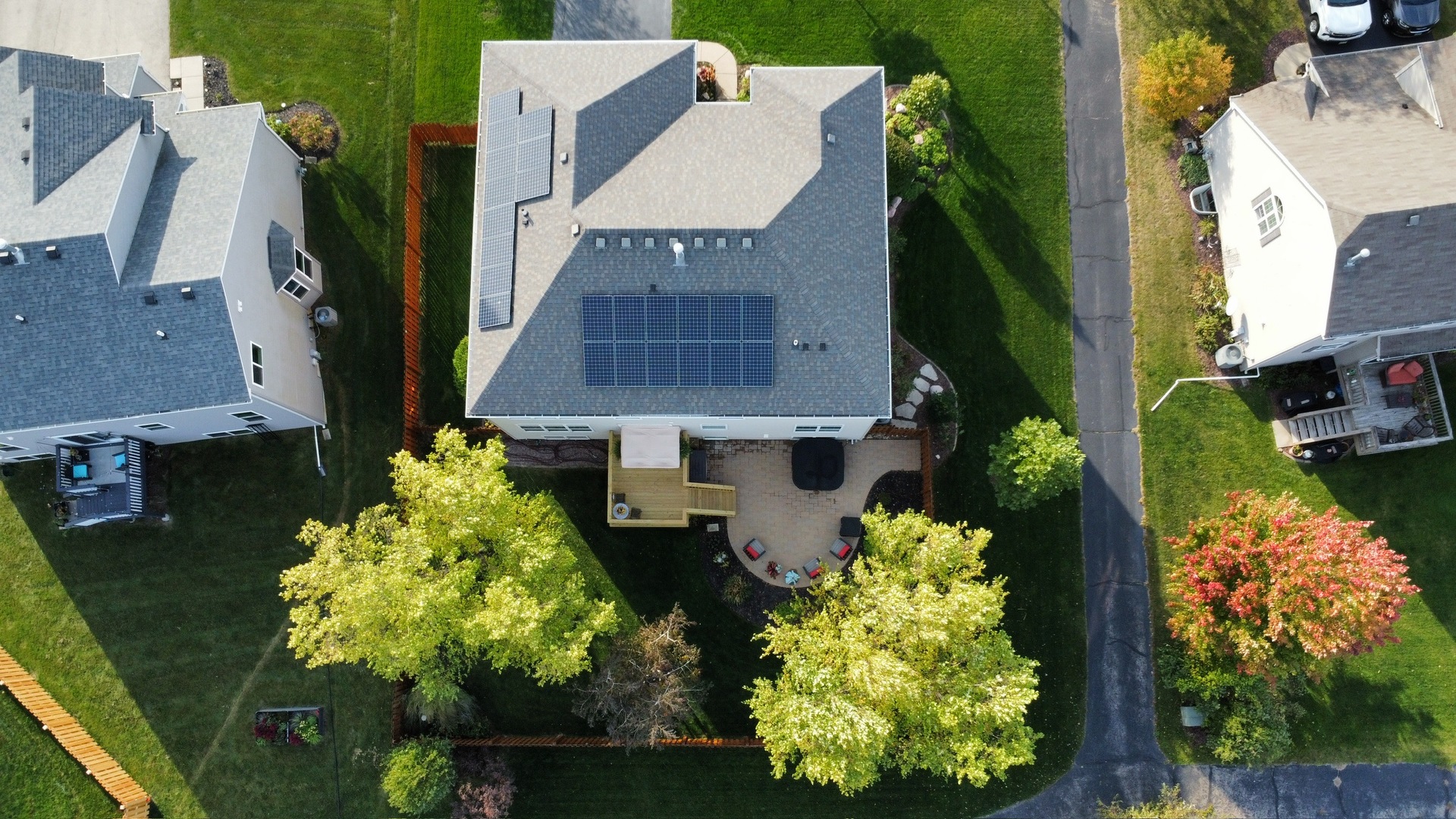 2681 Braeburn Way Woodstock, IL 60098 - Photo 38 of 41 an aerial view of a house with a yard and garden