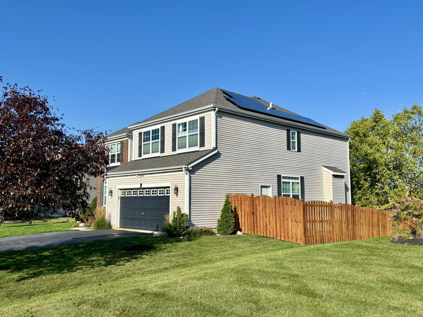 2681 Braeburn Way Woodstock, IL 60098 - Photo 4 of 41 a view of a house with a yard