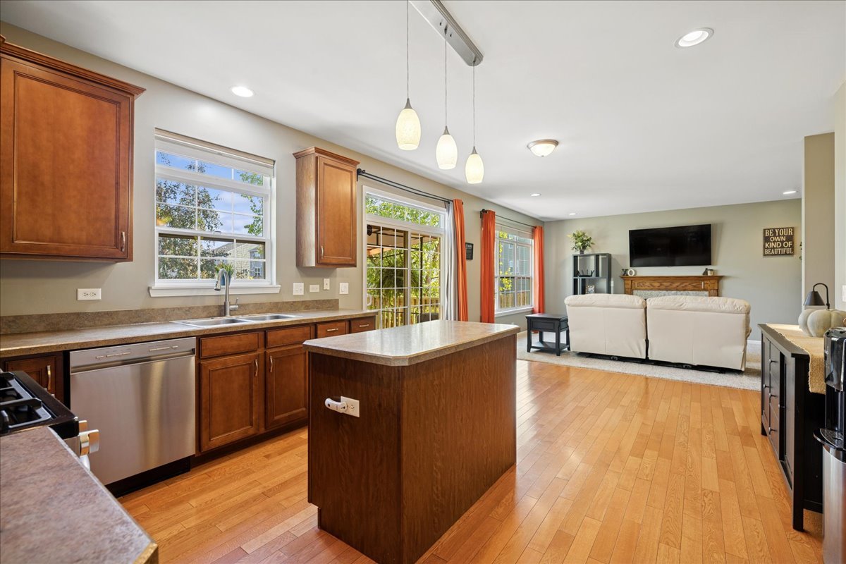 2681 Braeburn Way Woodstock, IL 60098 - Photo 9 of 41 a view of kitchen with sink microwave and stove