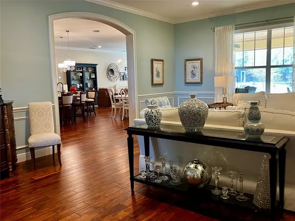 a room with furniture and wooden floor