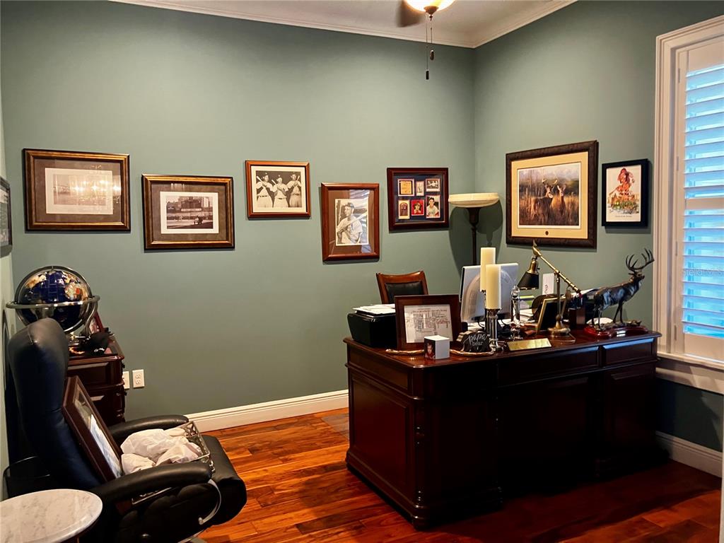 3709 Gallagher Road Plant City, FL 33565 - Photo 12 of 60 a room with furniture and wooden floor