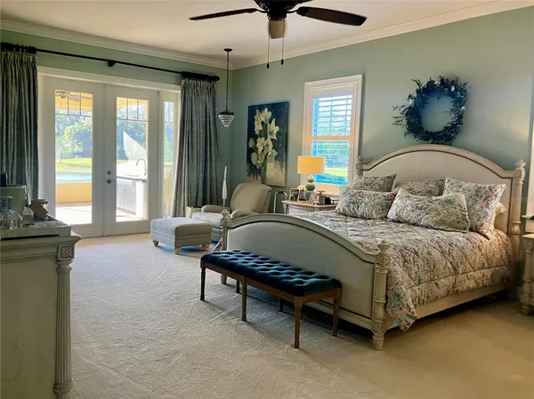 a bedroom with bed and window