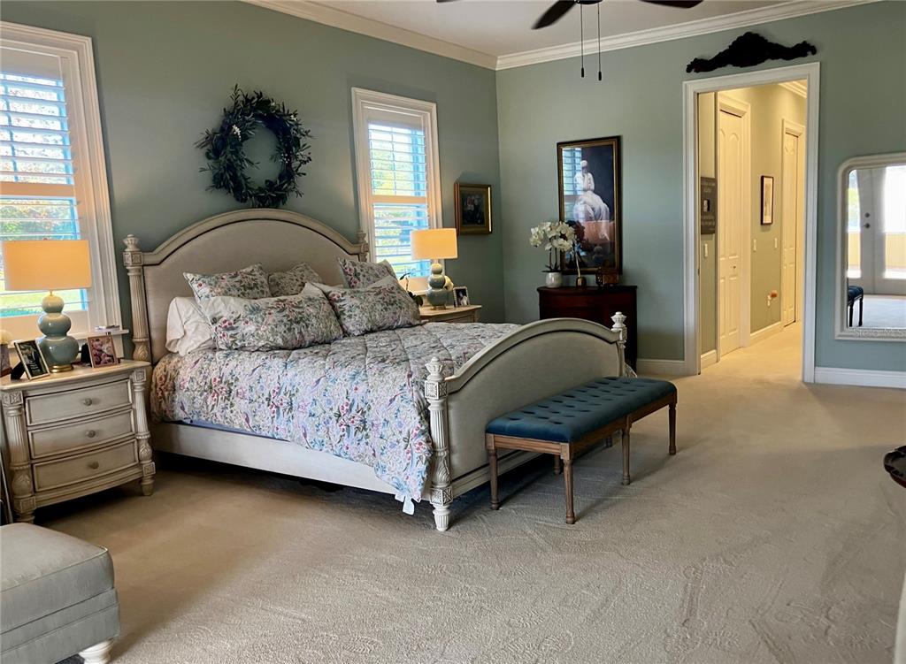 3709 Gallagher Road Plant City, FL 33565 - Photo 26 of 60 a bedroom with a bed and a dresser