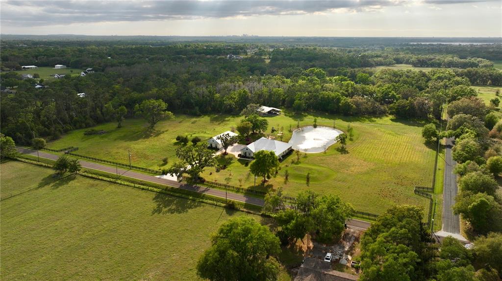 3709 Gallagher Road Plant City, FL 33565 - Photo 3 of 60 a view of a lake with a city