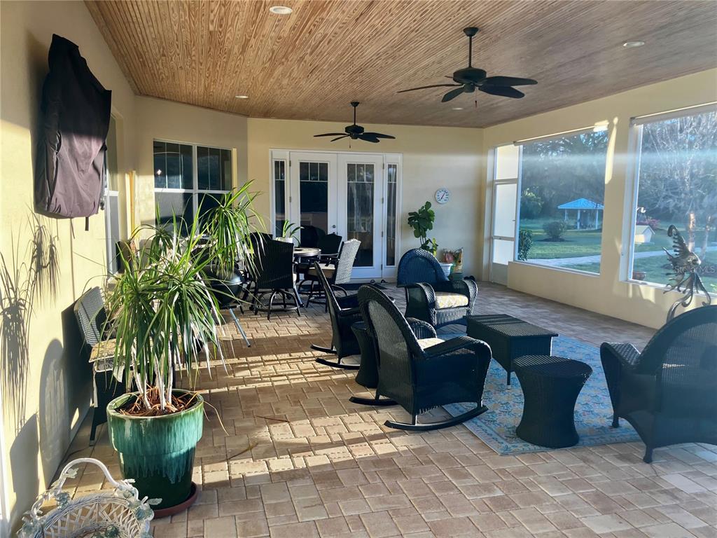 3709 Gallagher Road Plant City, FL 33565 - Photo 36 of 60 a living room with furniture and a large window