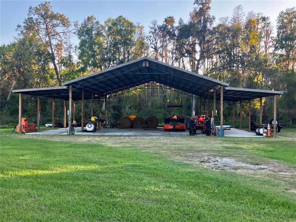 3709 Gallagher Road Plant City, FL 33565 - Photo 40 of 60 a view of a house with backyard and sitting area