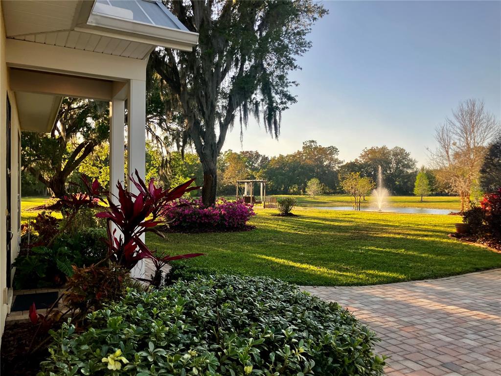 3709 Gallagher Road Plant City, FL 33565 - Photo 45 of 60 a view of a fountain in front of a house