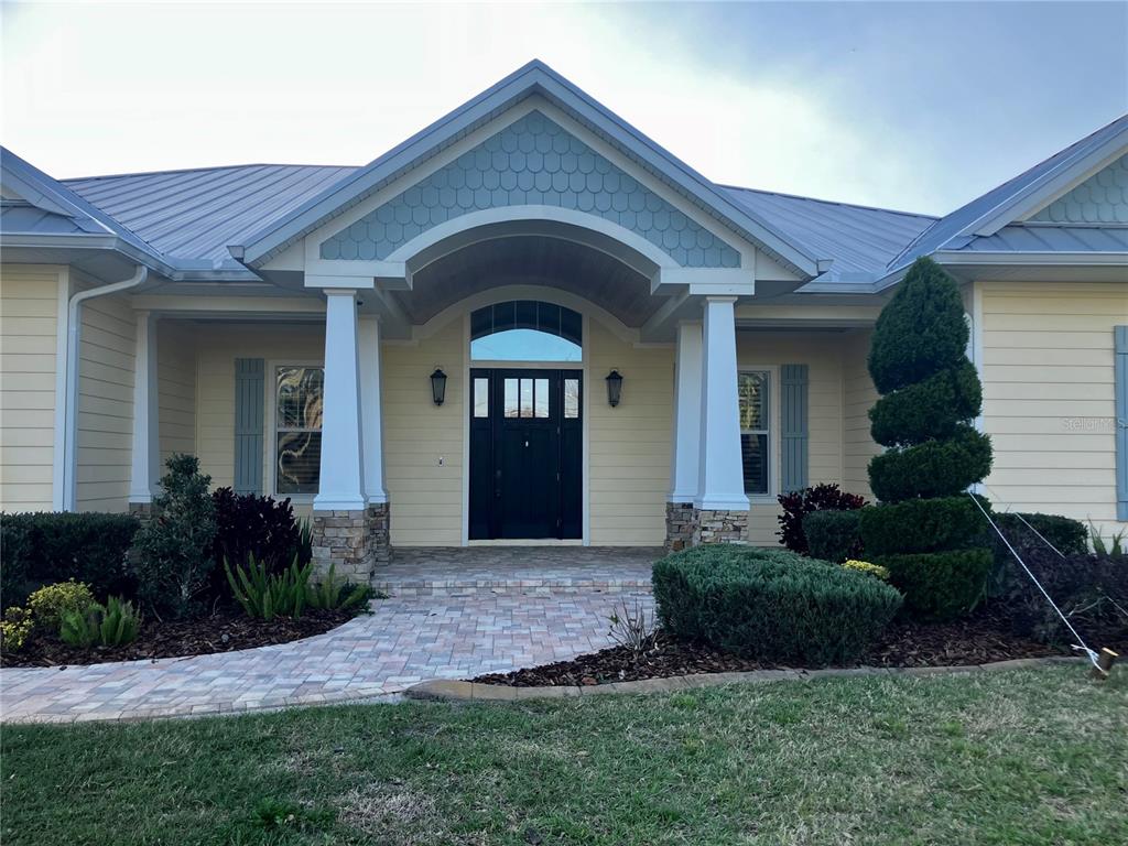 3709 Gallagher Road Plant City, FL 33565 - Photo 5 of 60 a front view of a house with a yard