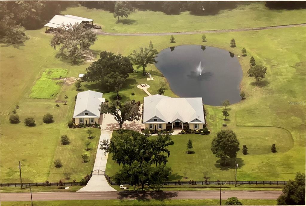 3709 Gallagher Road Plant City, FL 33565 - Photo 55 of 60 an aerial view of residential houses with outdoor space
