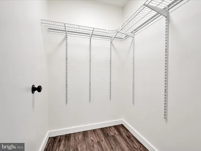 a view of a room with racks on the wall