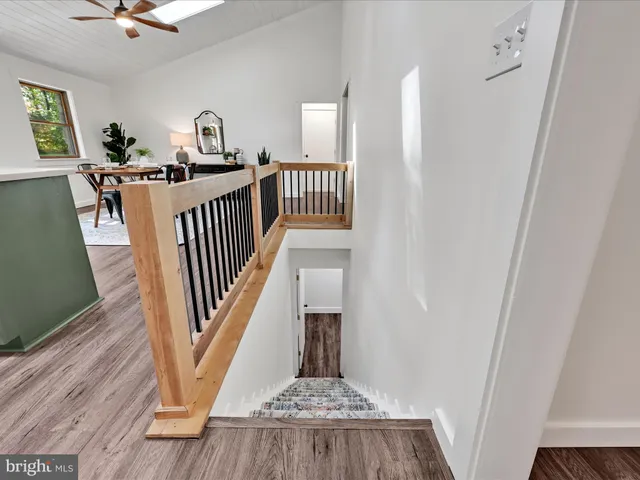 a view of entryway with wooden floor