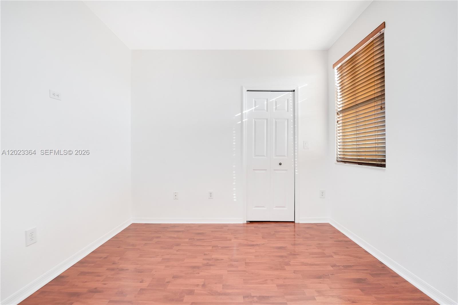 27433 Southwest 137th Court, Unit 1 Homestead, FL 33032 - Photo 12 of 28 a view of an empty room