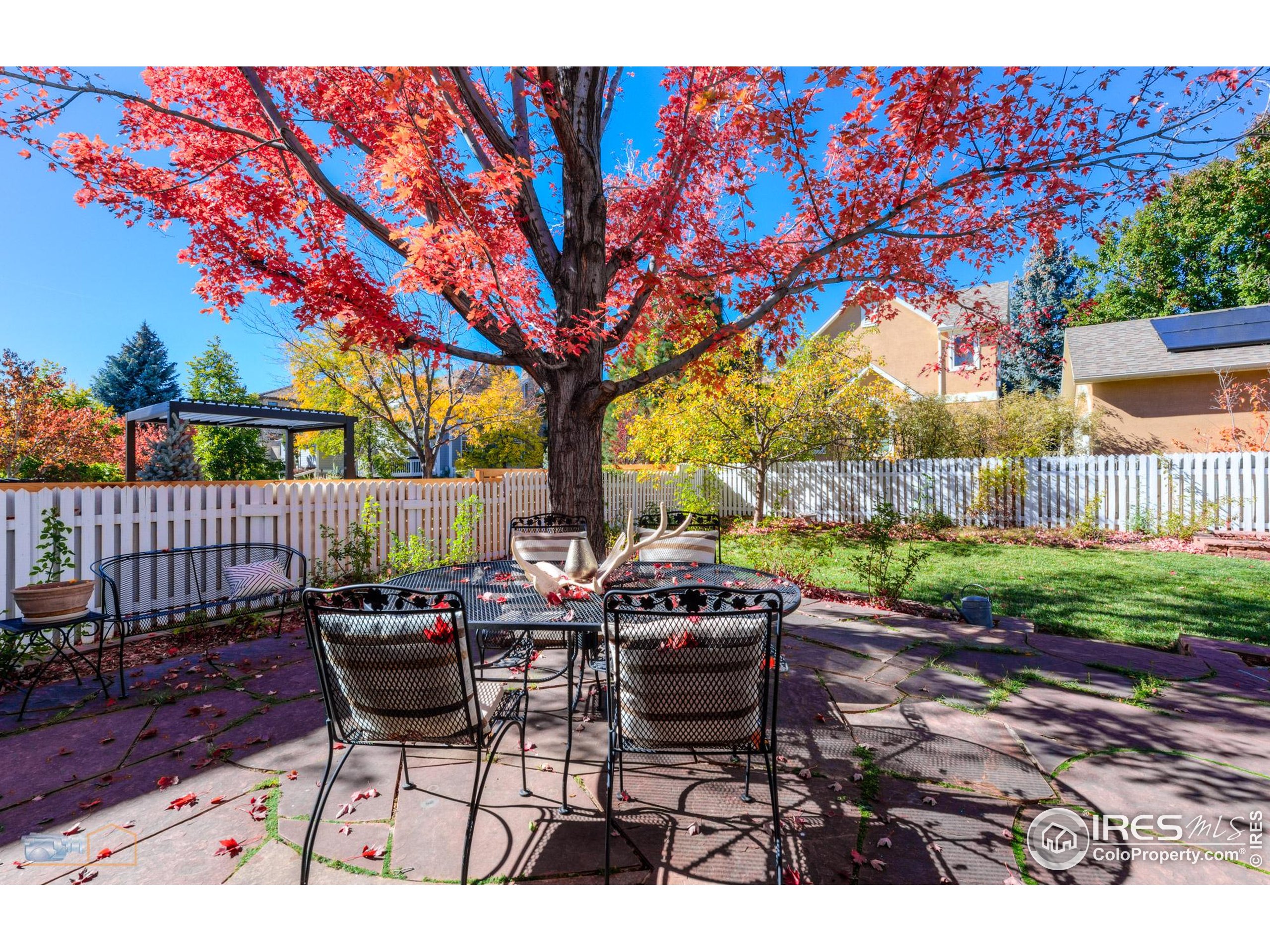 4921 Fountain Street Boulder, CO 80304 - Photo 11 of 50 a patio with glass top table and chairs