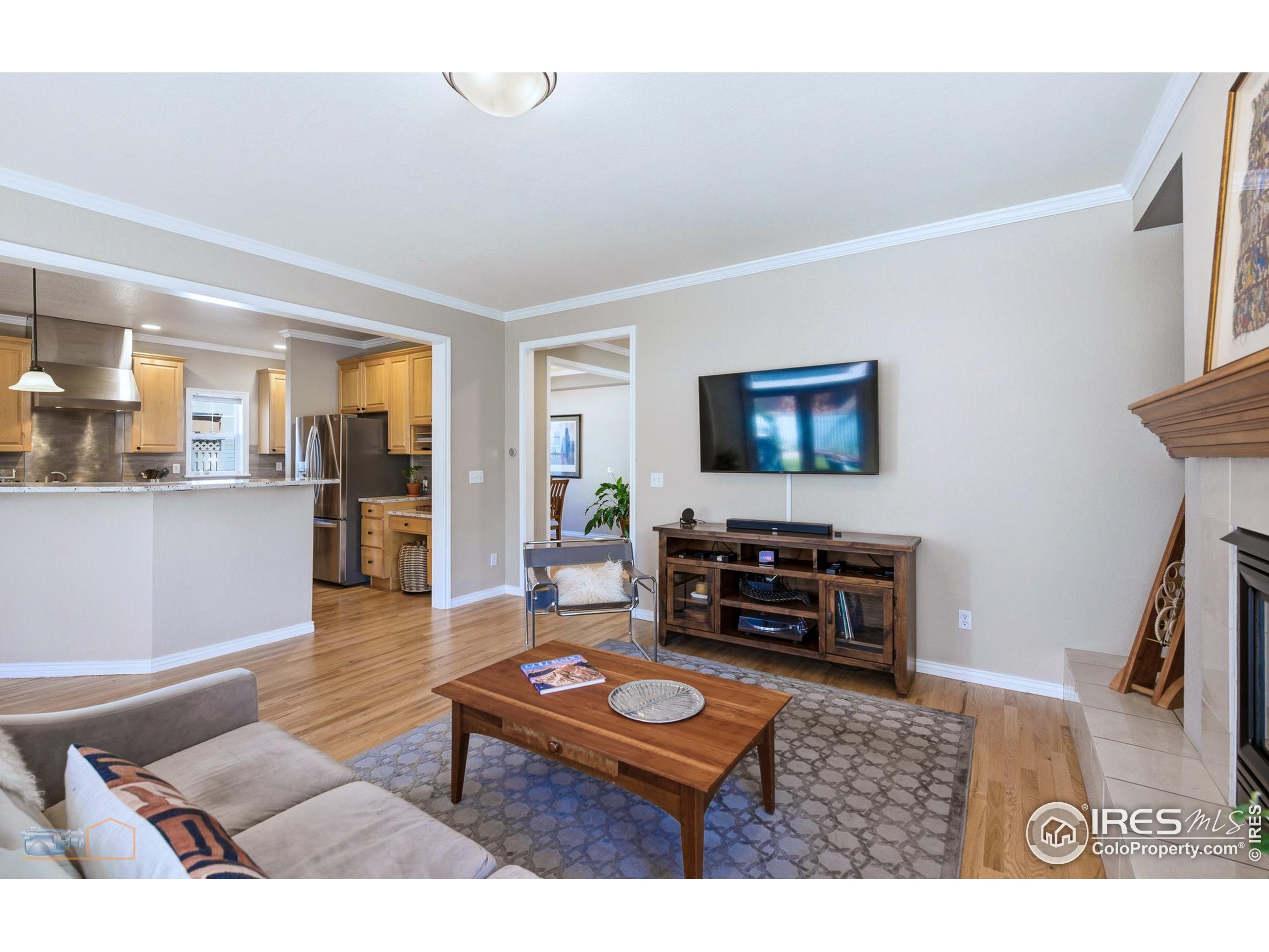 4921 Fountain Street Boulder, CO 80304 - Photo 13 of 50 a living room with furniture and a flat screen tv