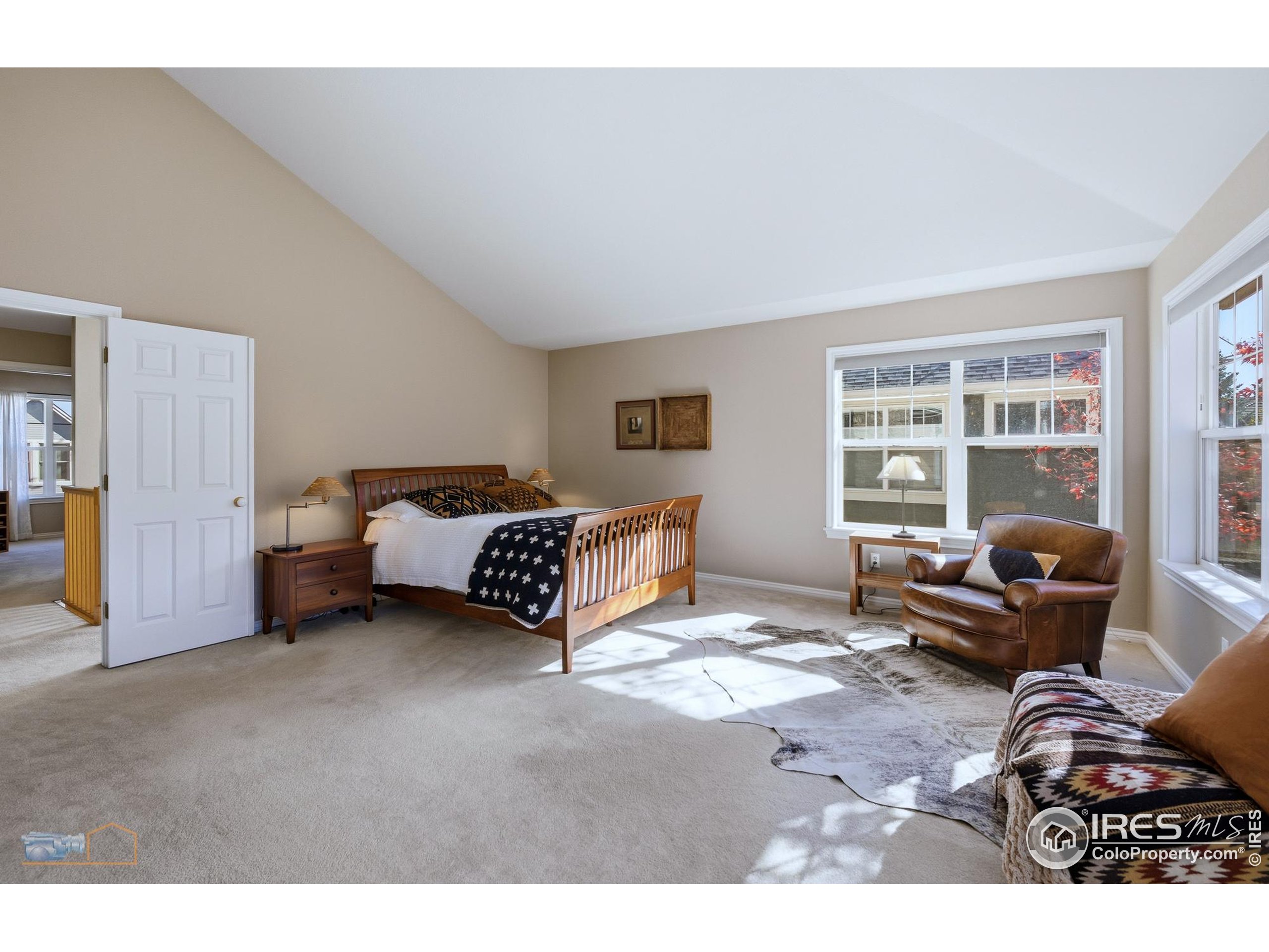 4921 Fountain Street Boulder, CO 80304 - Photo 19 of 50 a bedroom with bed couch and window