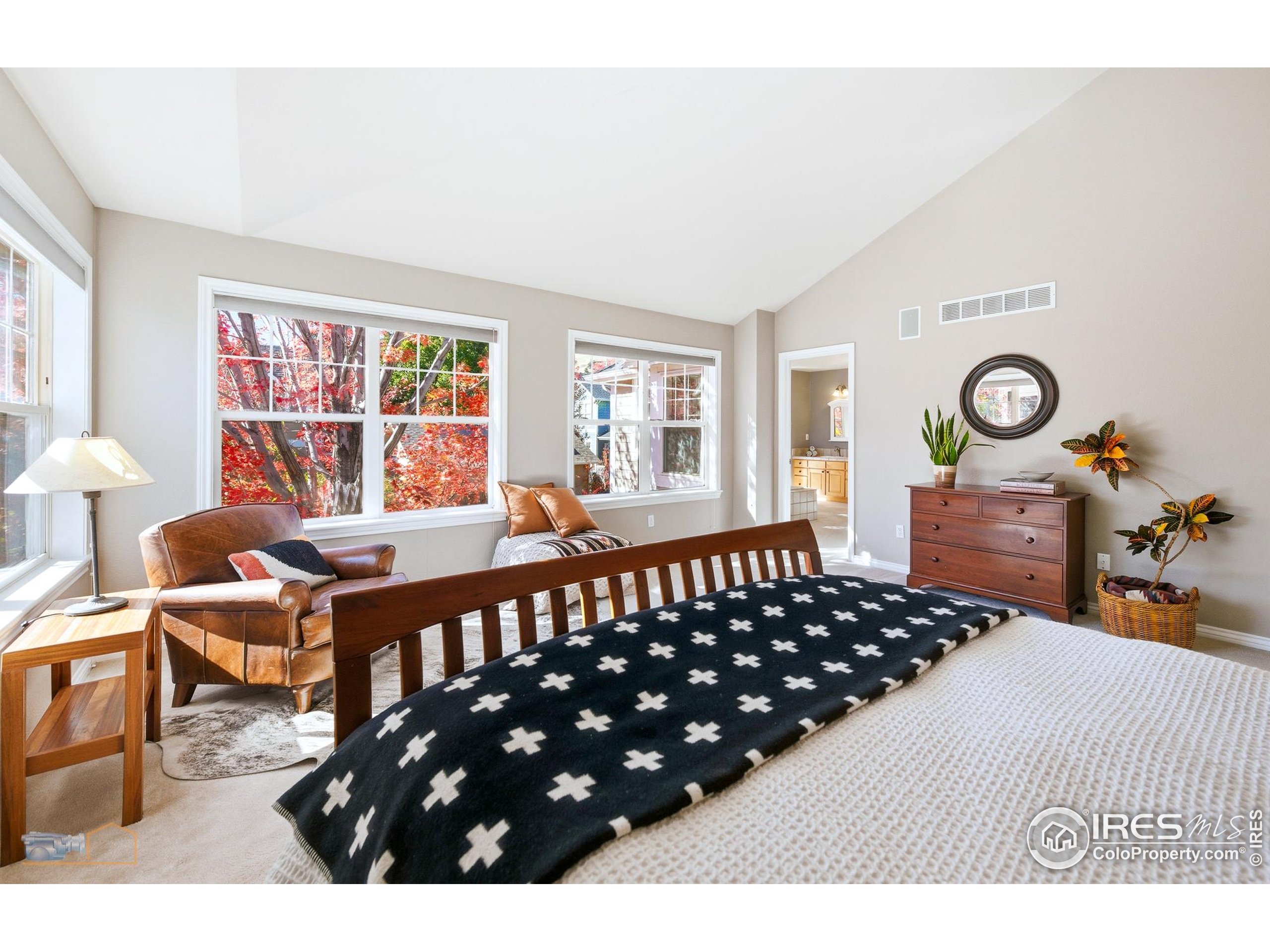 4921 Fountain Street Boulder, CO 80304 - Photo 22 of 50 a bedroom with a bed window and table