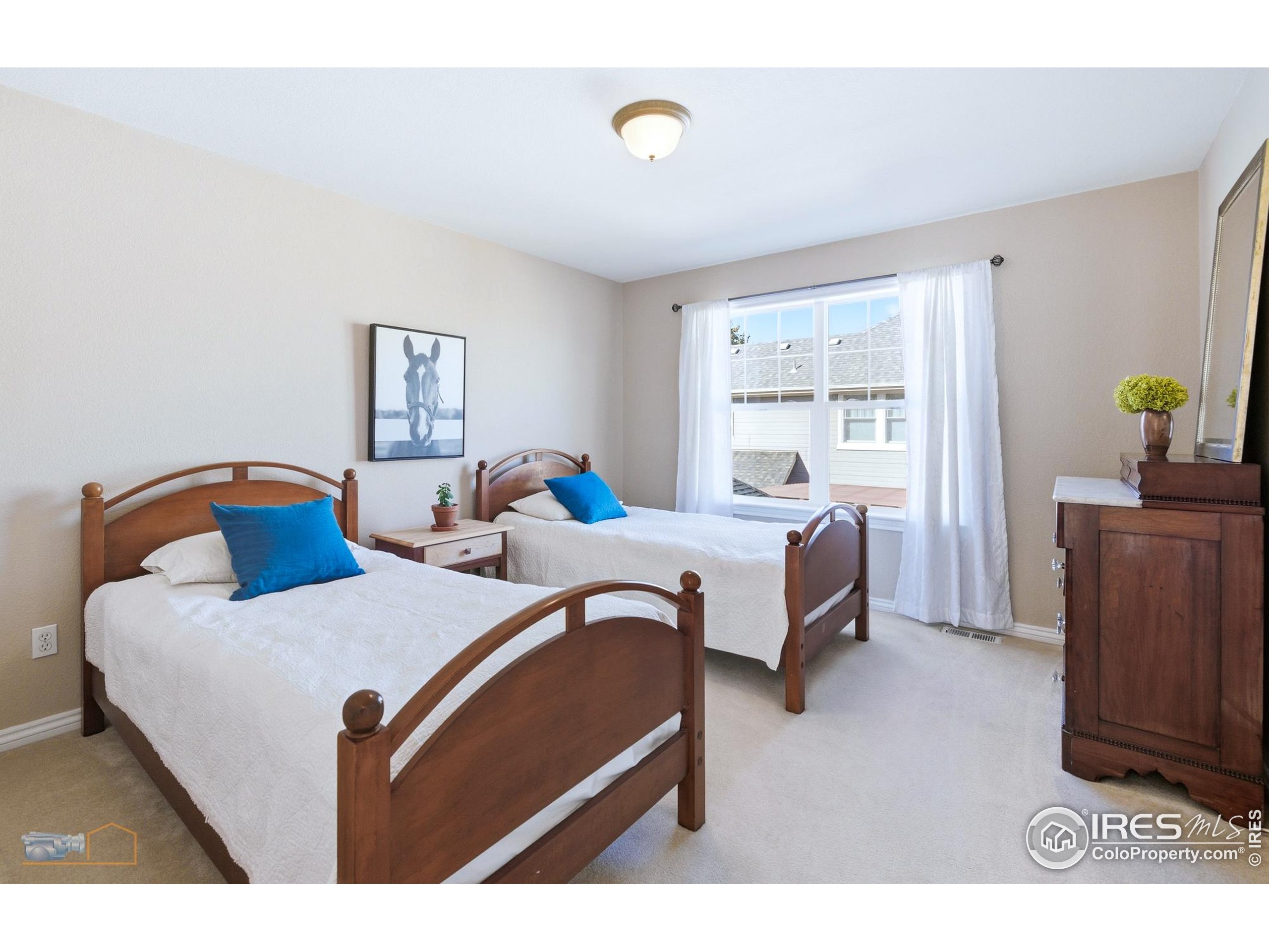 4921 Fountain Street Boulder, CO 80304 - Photo 28 of 50 a bedroom with two beds and a window
