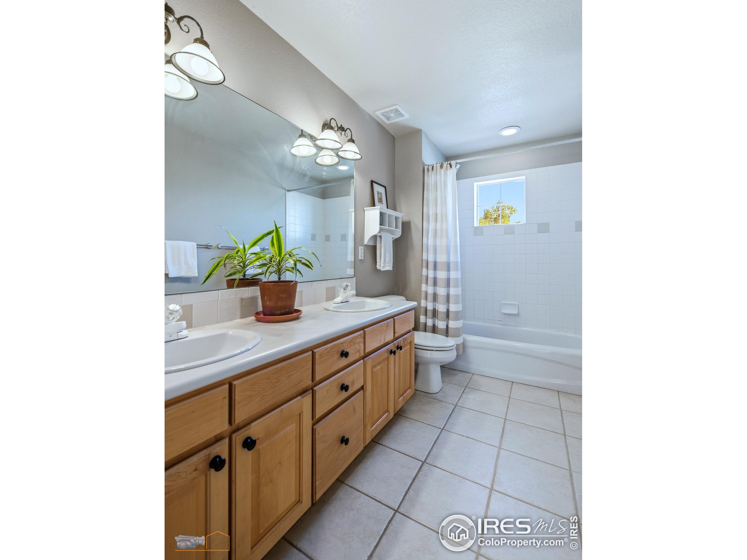4921 Fountain Street Boulder, CO 80304 - Photo 30 of 50 a bathroom with a double vanity sink and a